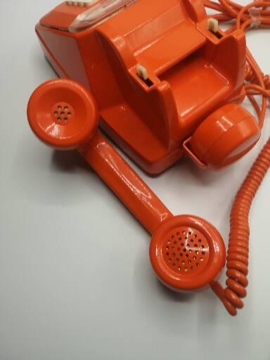 Vintage bakelite orange phone