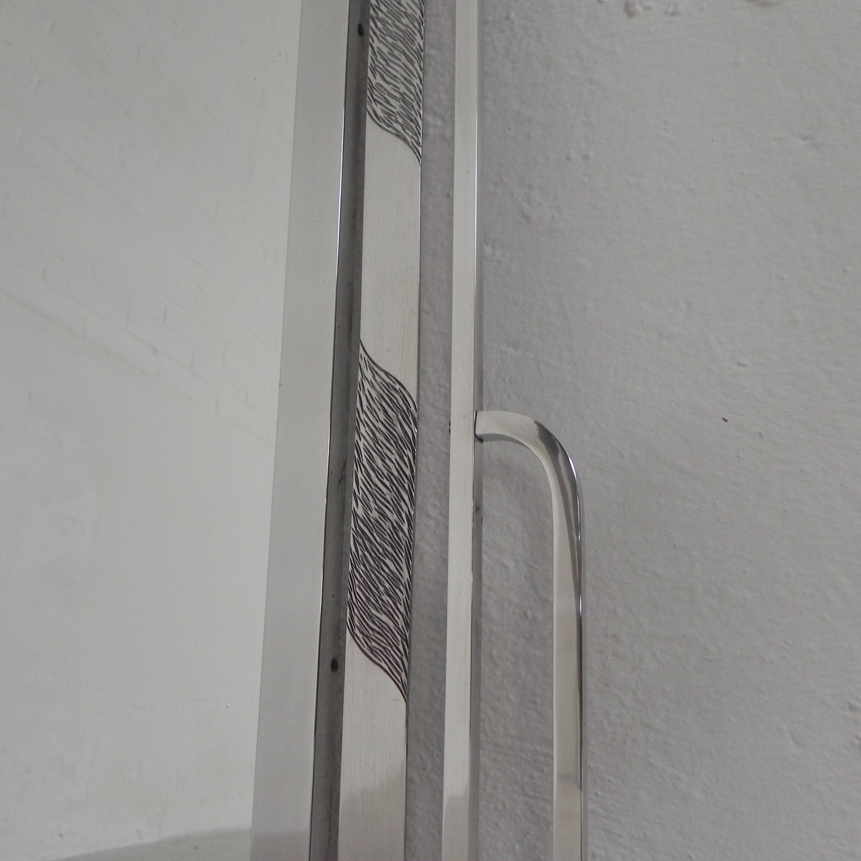 Art Deco mirror with faceted glass in aluminum frame, 1930s