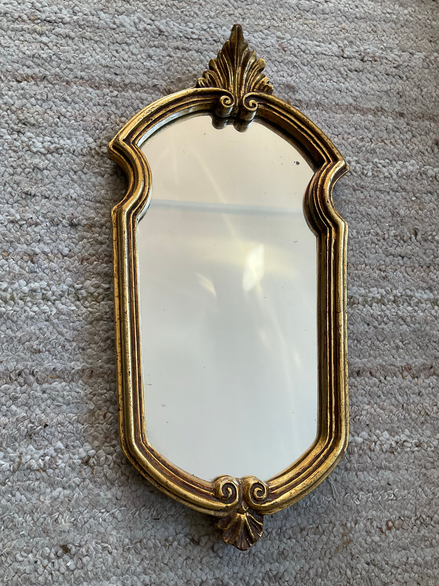 Vintage gilded wood Rococo mirror from the 1970s.