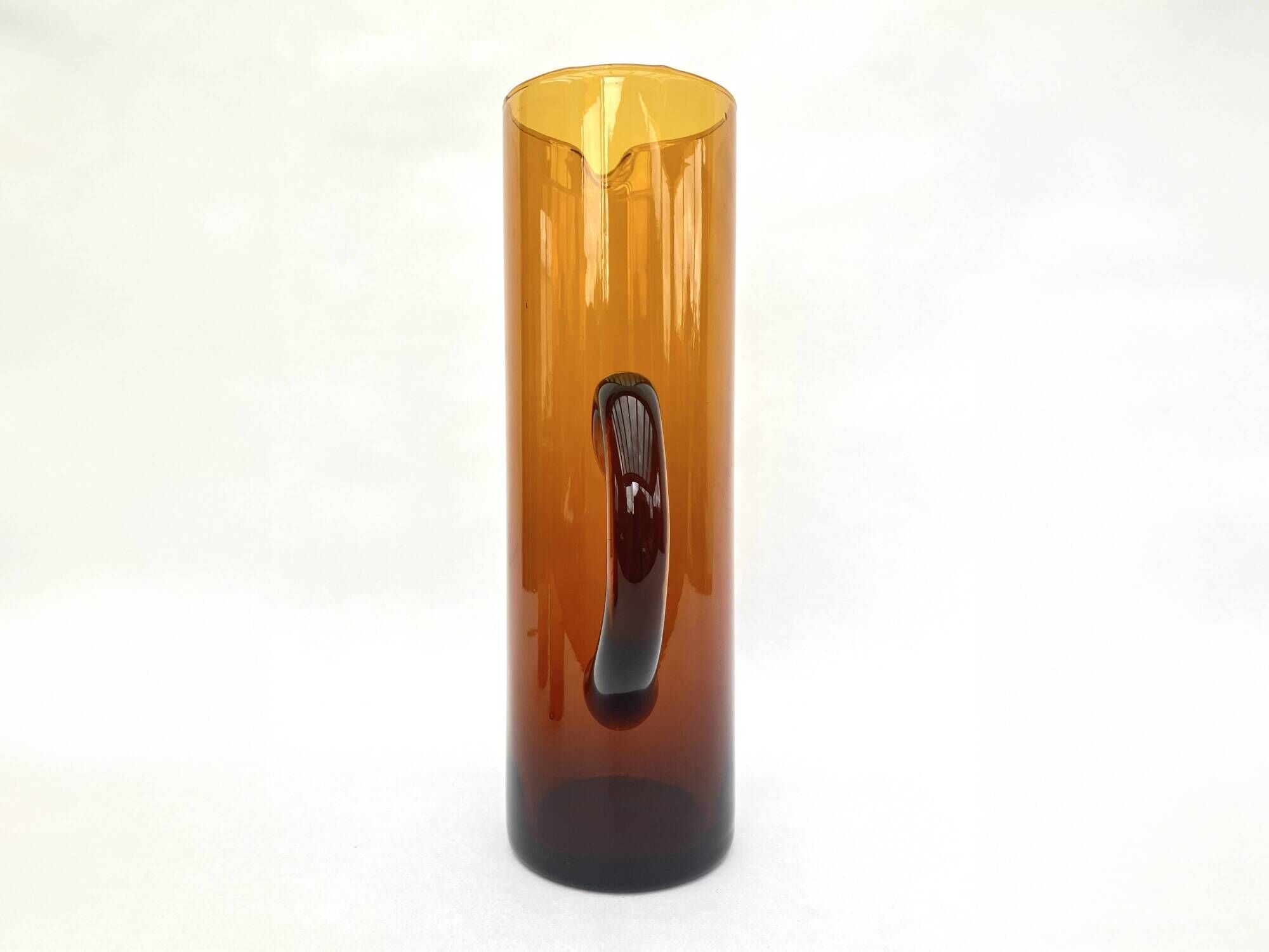 Carafe/pitcher and two amber glasses • Blown glass • France • 1970s
