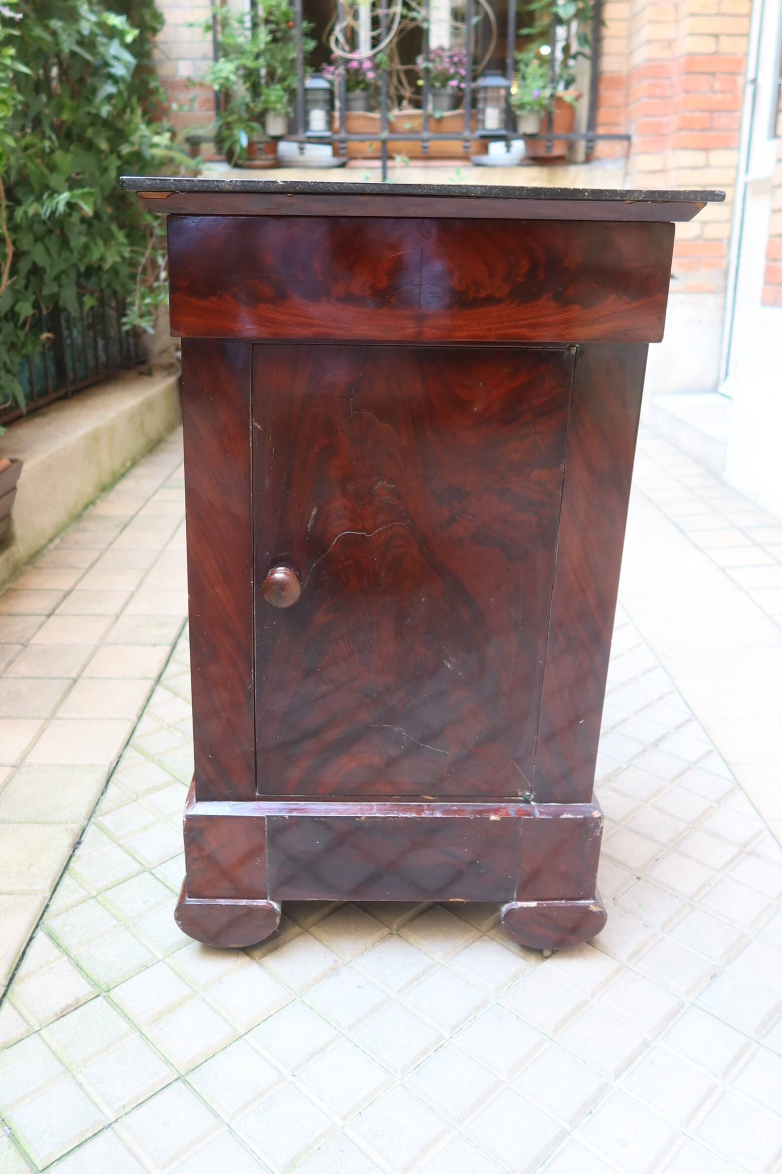 Mahogany bedside table with marble top