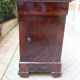Mahogany bedside table with marble top