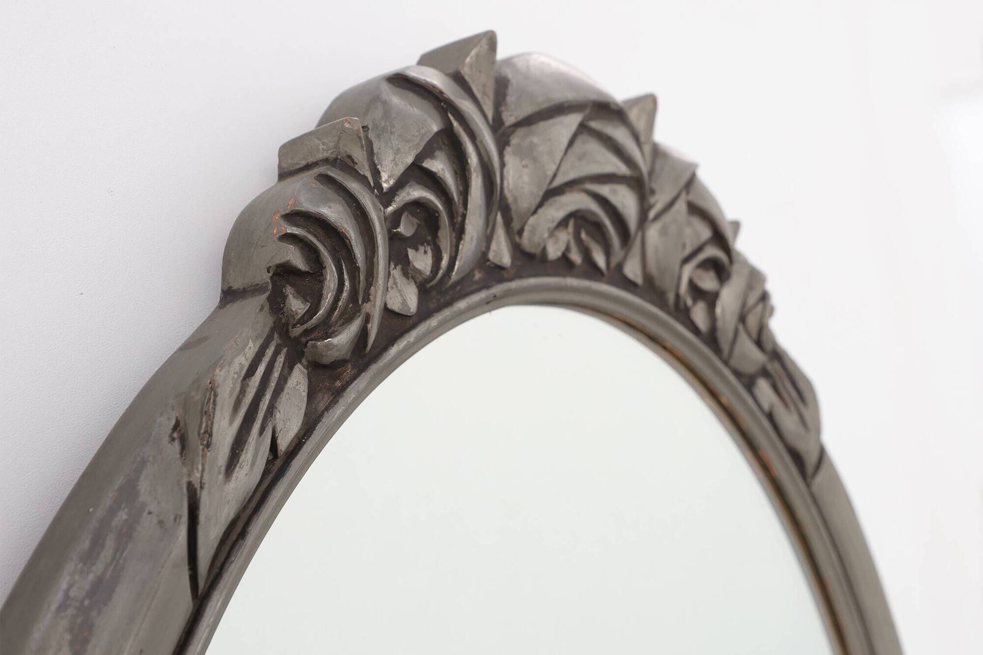French Art Deco Oval Mirror with Carved Roses and Silver-Painted Frame