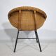 Woven rattan armchair from the 1960s