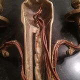 Pair of Louis XVI style sconces in gilded bronze