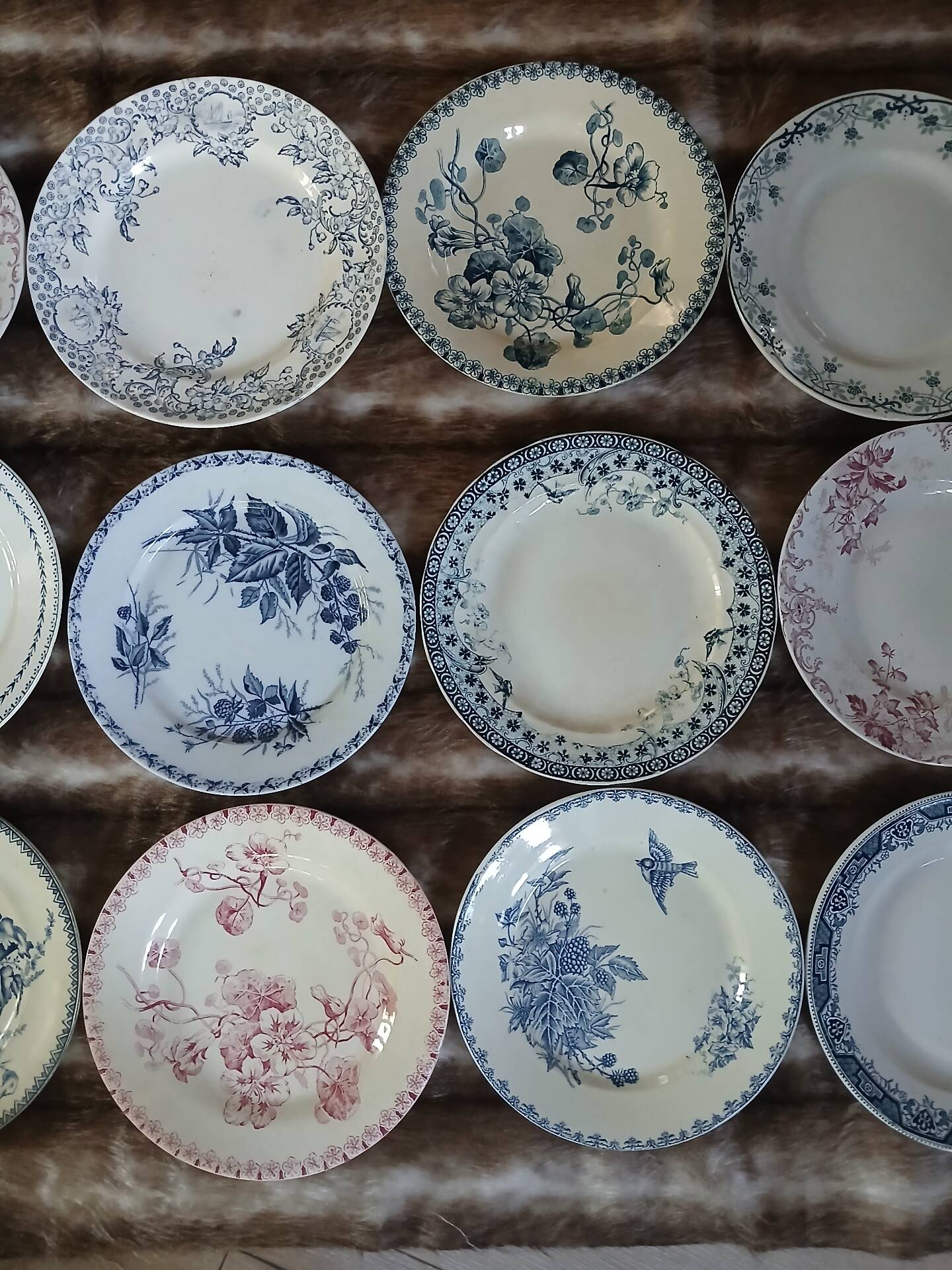20 mismatched antique flat plates in ironstone