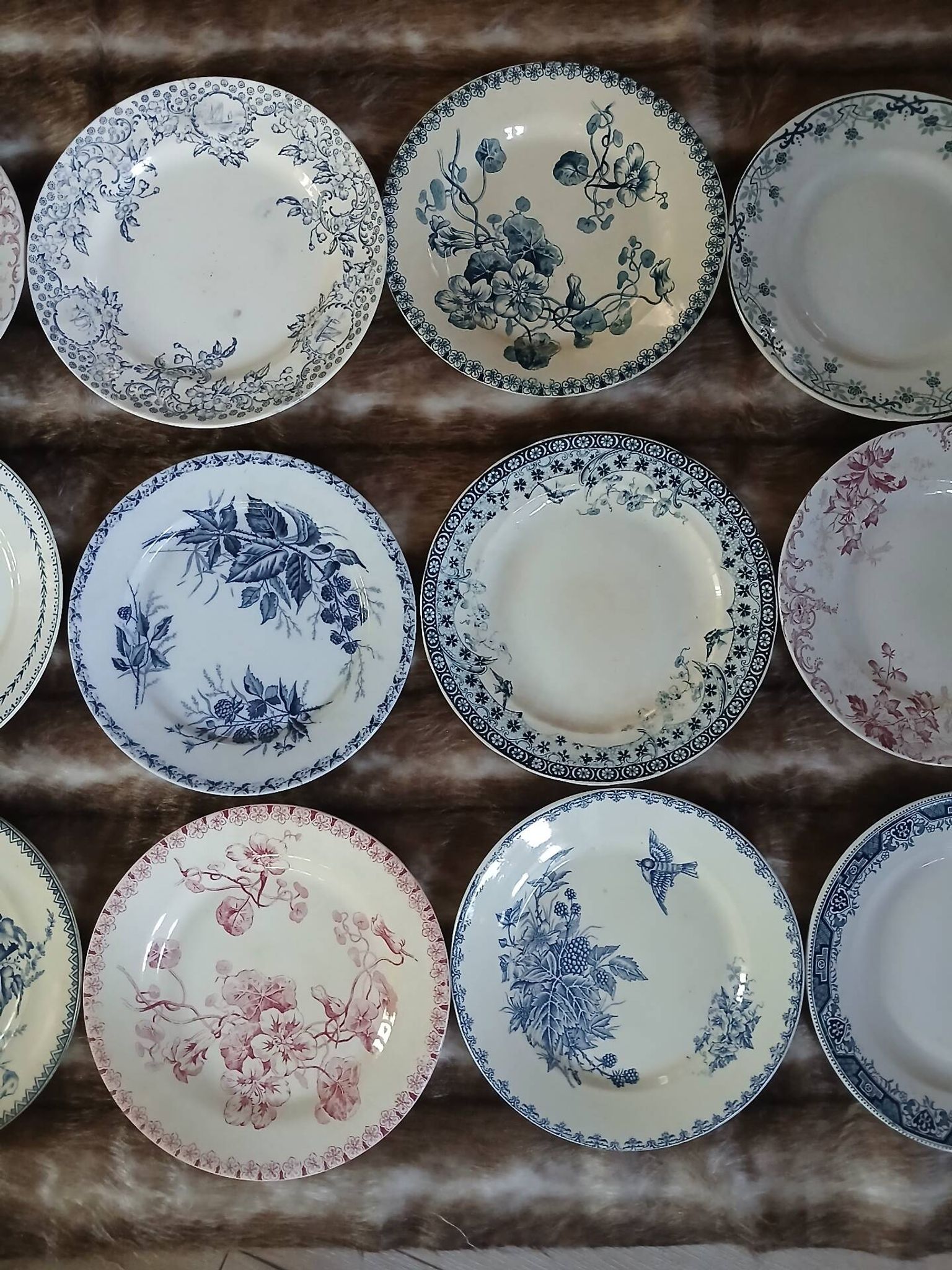20 mismatched antique flat plates in ironstone