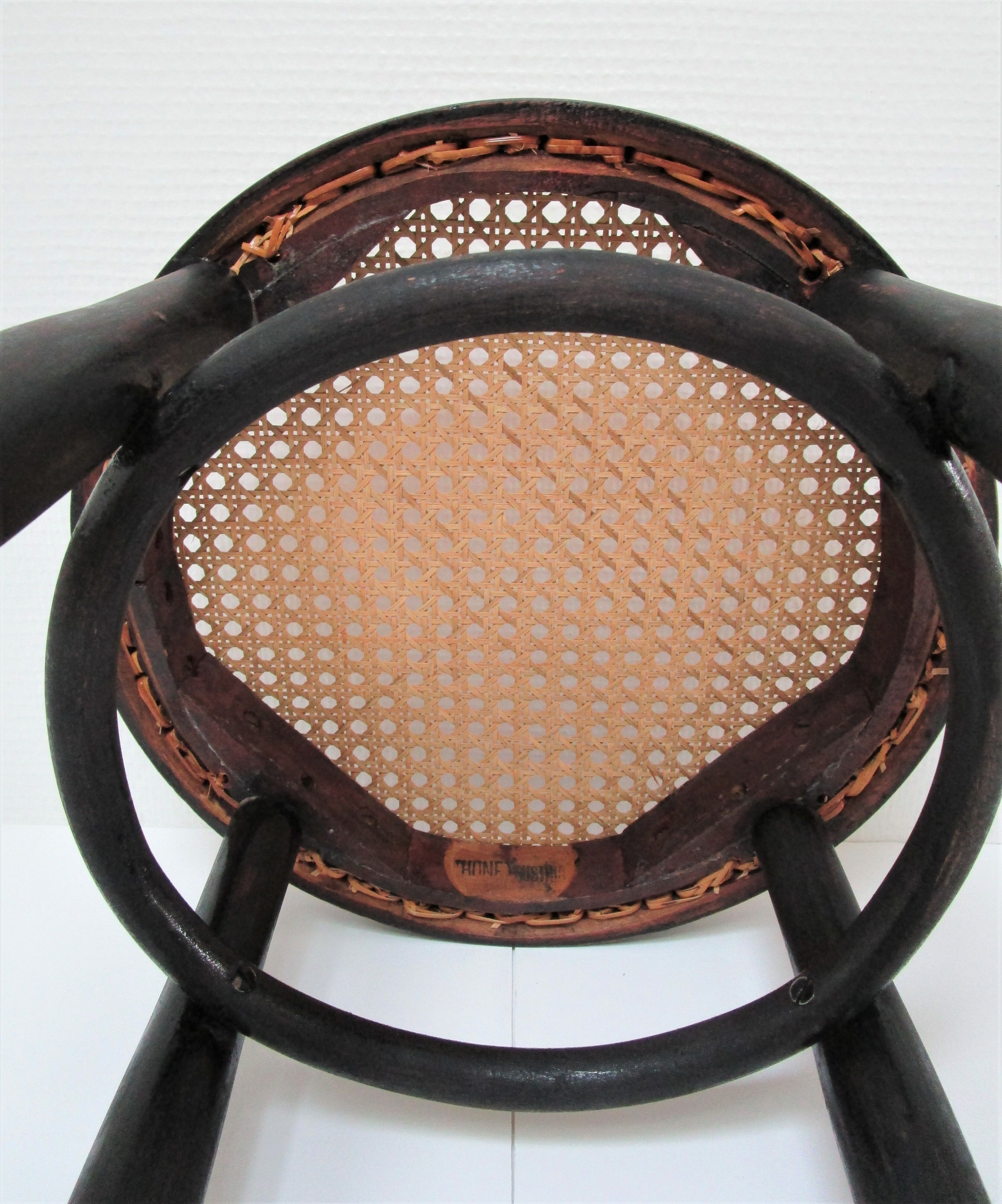 Black skated Thonet stool stamped