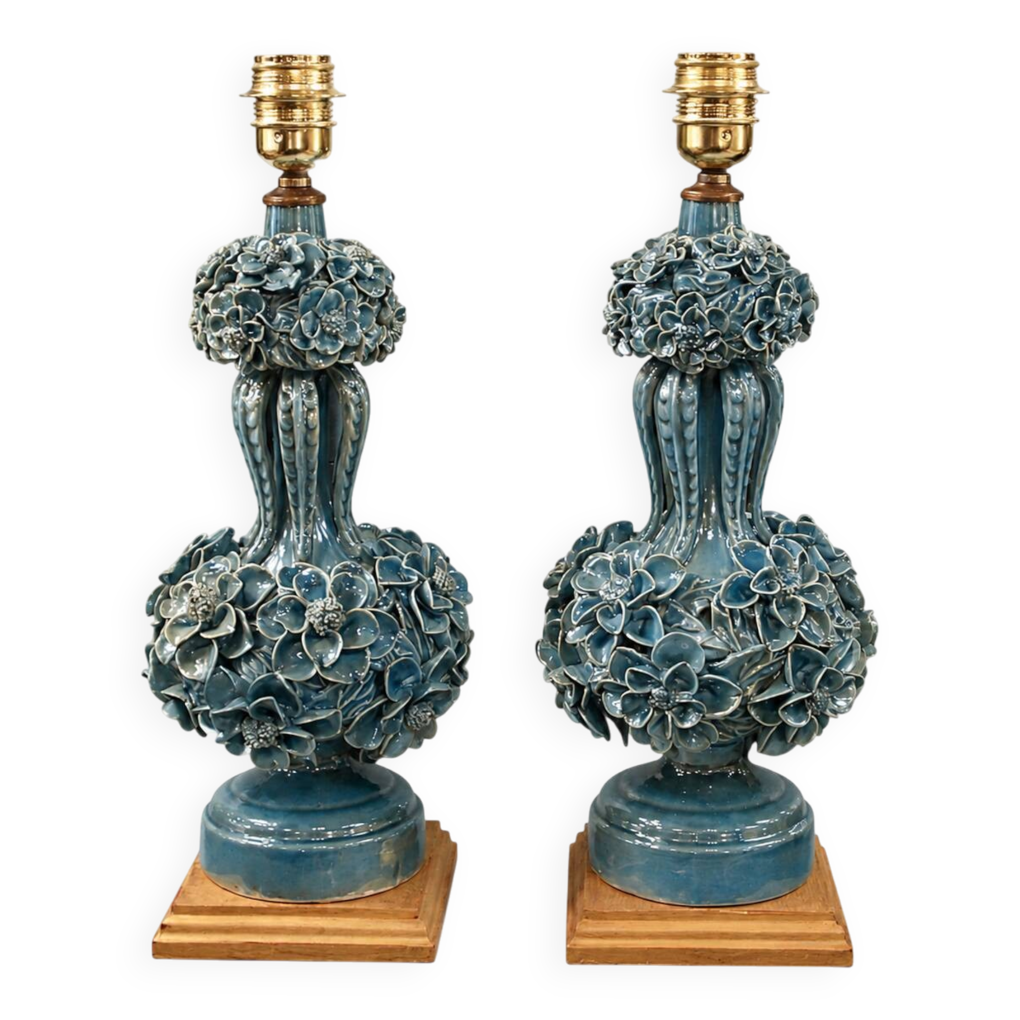 Pair of iridescent light blue lamps, featuring a floral bush design
