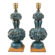 Pair of iridescent light blue lamps, featuring a floral bush design