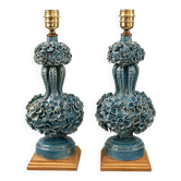 Pair of iridescent light blue lamps, featuring a floral bush design
