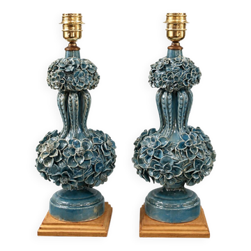 Pair of iridescent light blue lamps, featuring a floral bush design