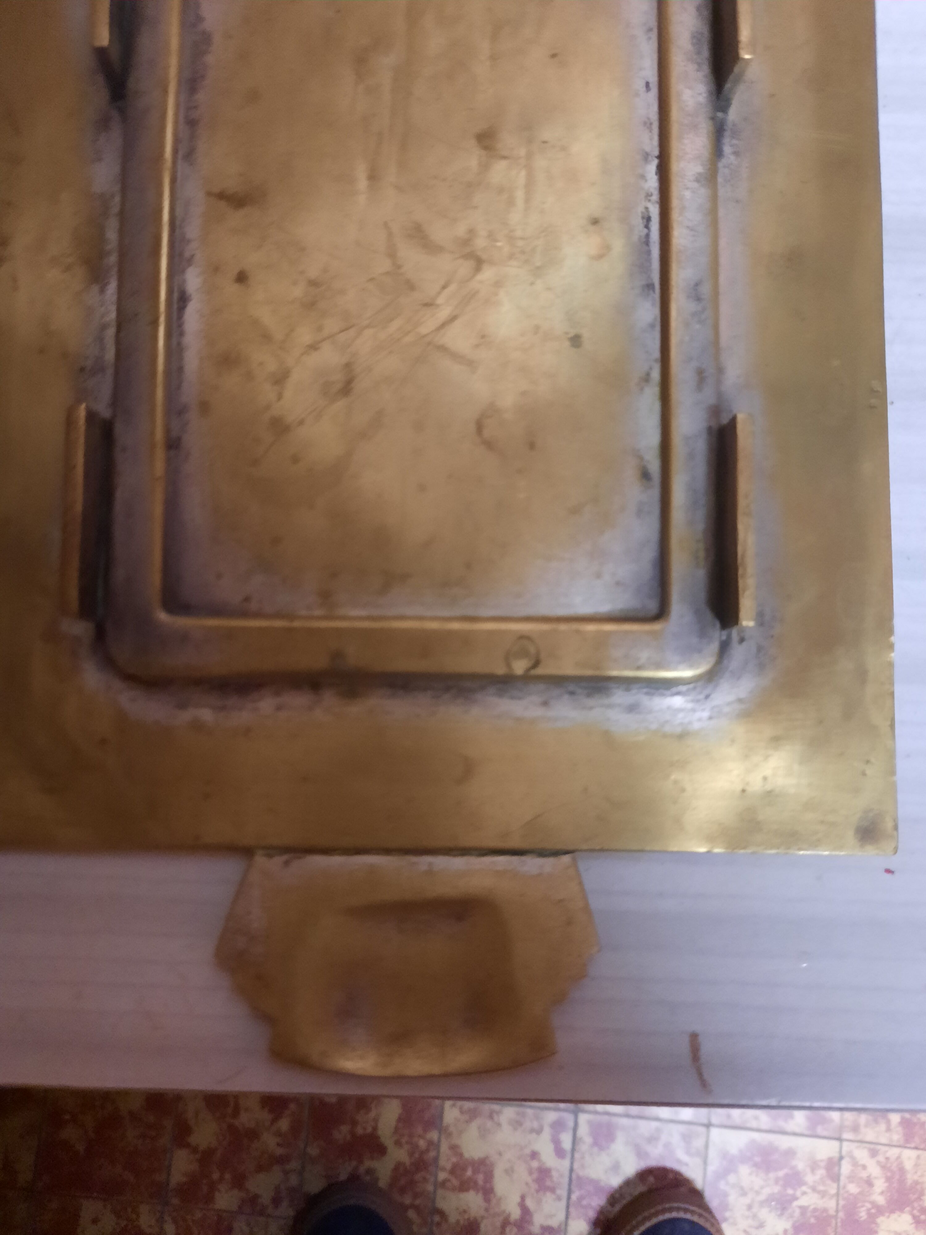Gilded brass top