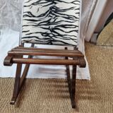 Zebra rocking footrest from 1960