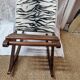 Zebra rocking footrest from 1960