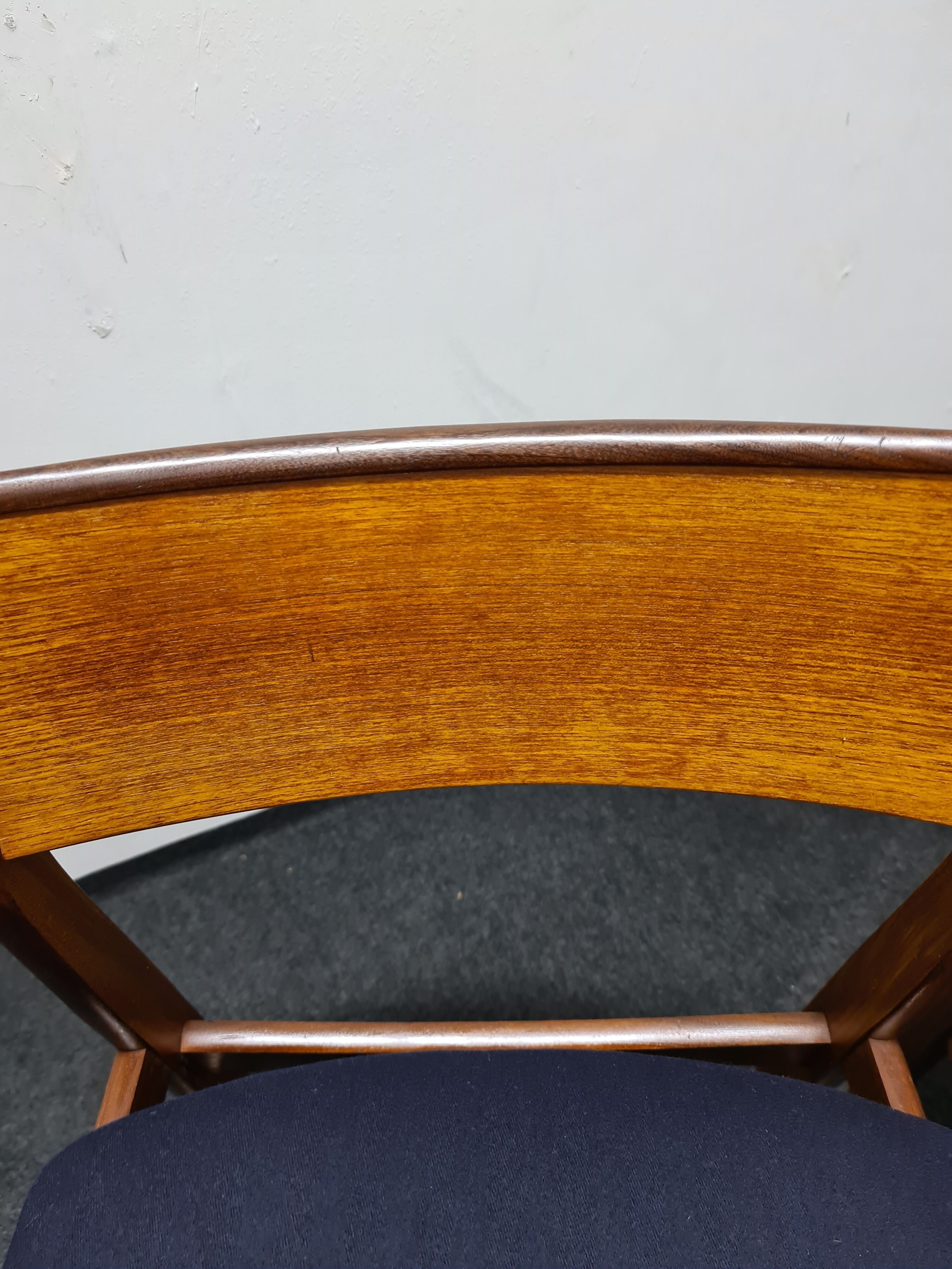 A pair of vintage teak dinning chairs