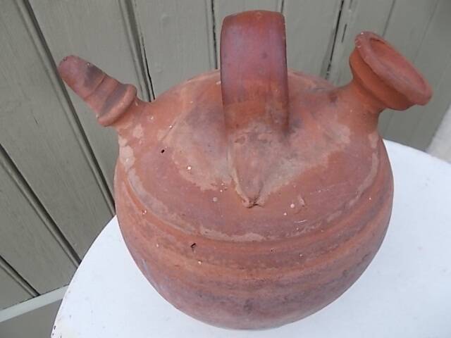 Terracotta gargoulette jug