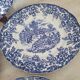 4 earthenware plates with floral and pastoral scene motif