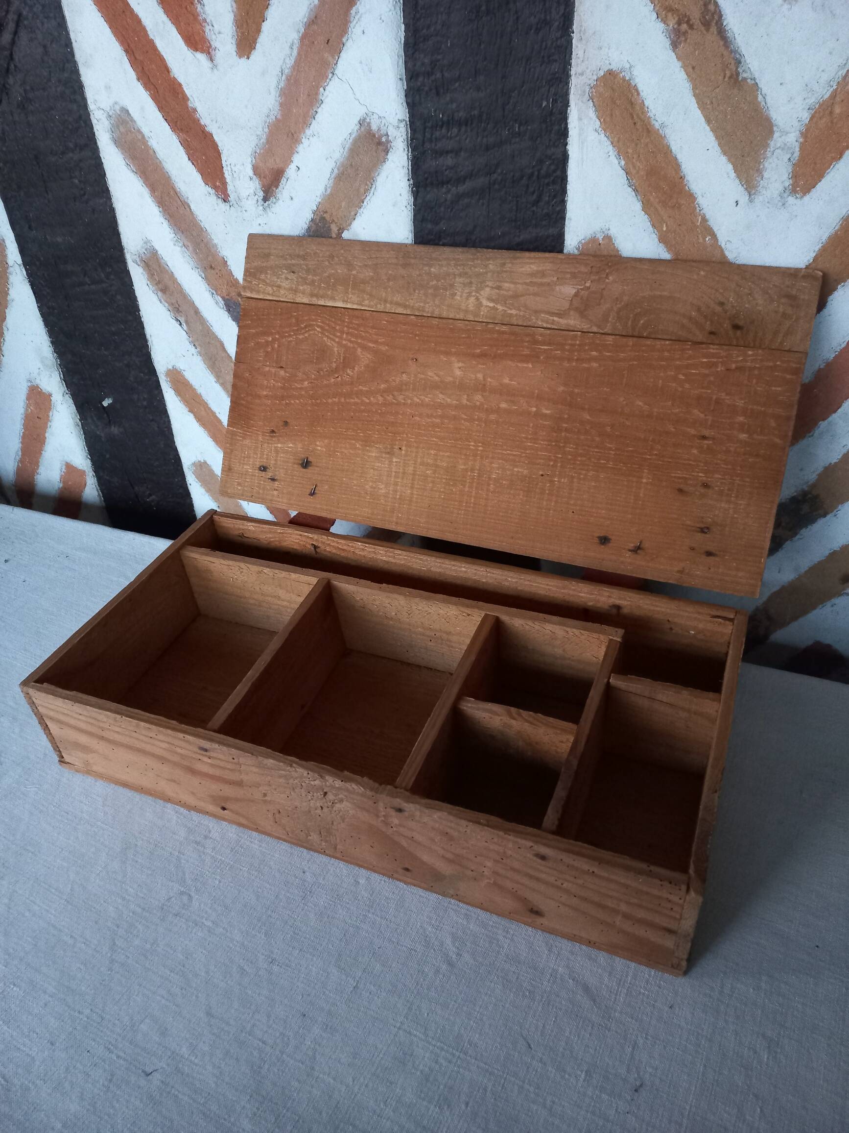 Old compartmentalized wooden box crate
