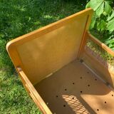 Vintage wooden and rattan baby cot from the 1960s.