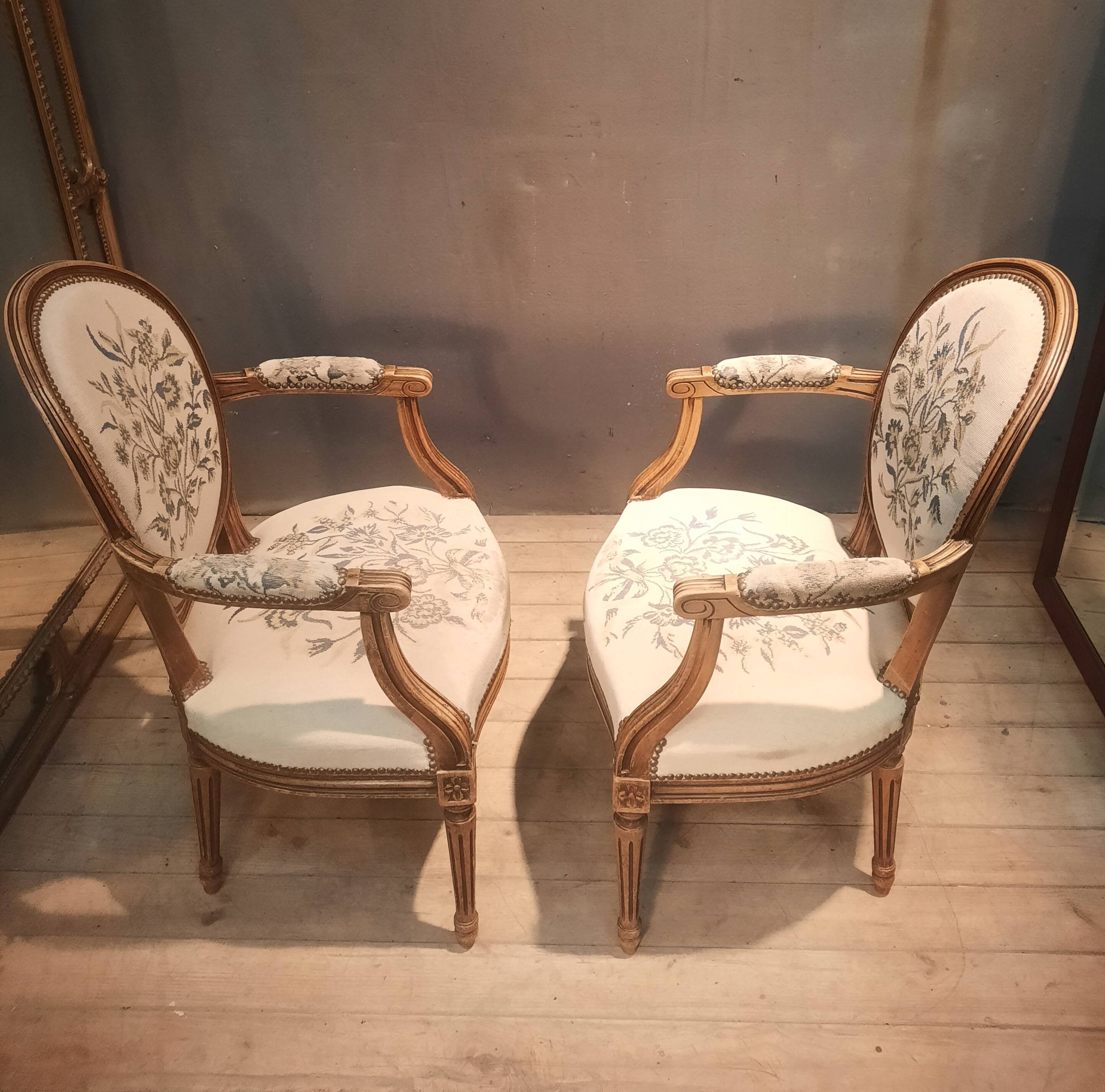Pair of Louis XV style medallion armchairs.