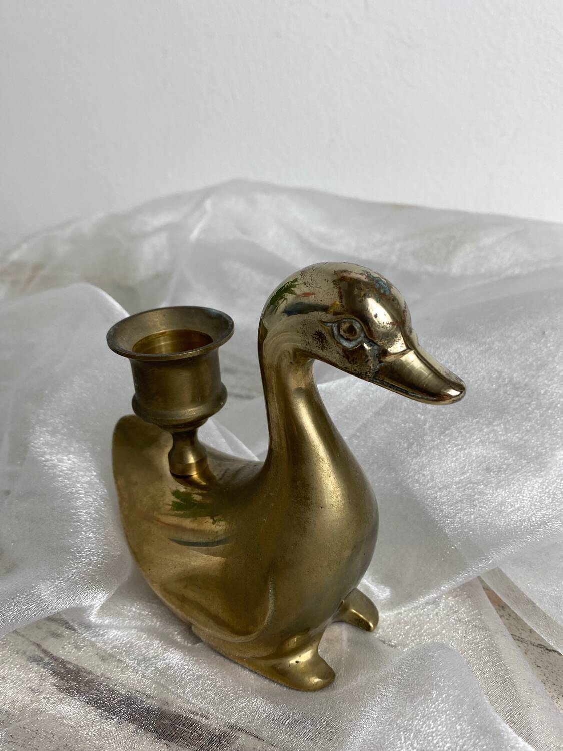 Brass swan-shaped candlestick