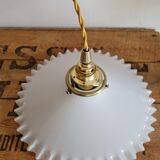 Toothed opaline suspension