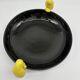 Large vintage black ceramic bowl with yellow parakeets, Vallauris.