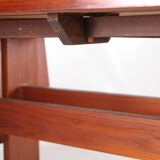 Extendable dining table in rosewood and ceramic