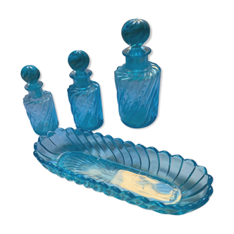 Toiletries and vintage blue glass bottles