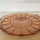 Pink glass plate with handles in Rosaline style.