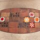 Lava stone, ceramic and steel coffee table by Jean Jaffeux 1960.