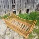 Former cradle bed baby rotin curved on vintage 60s roulettes