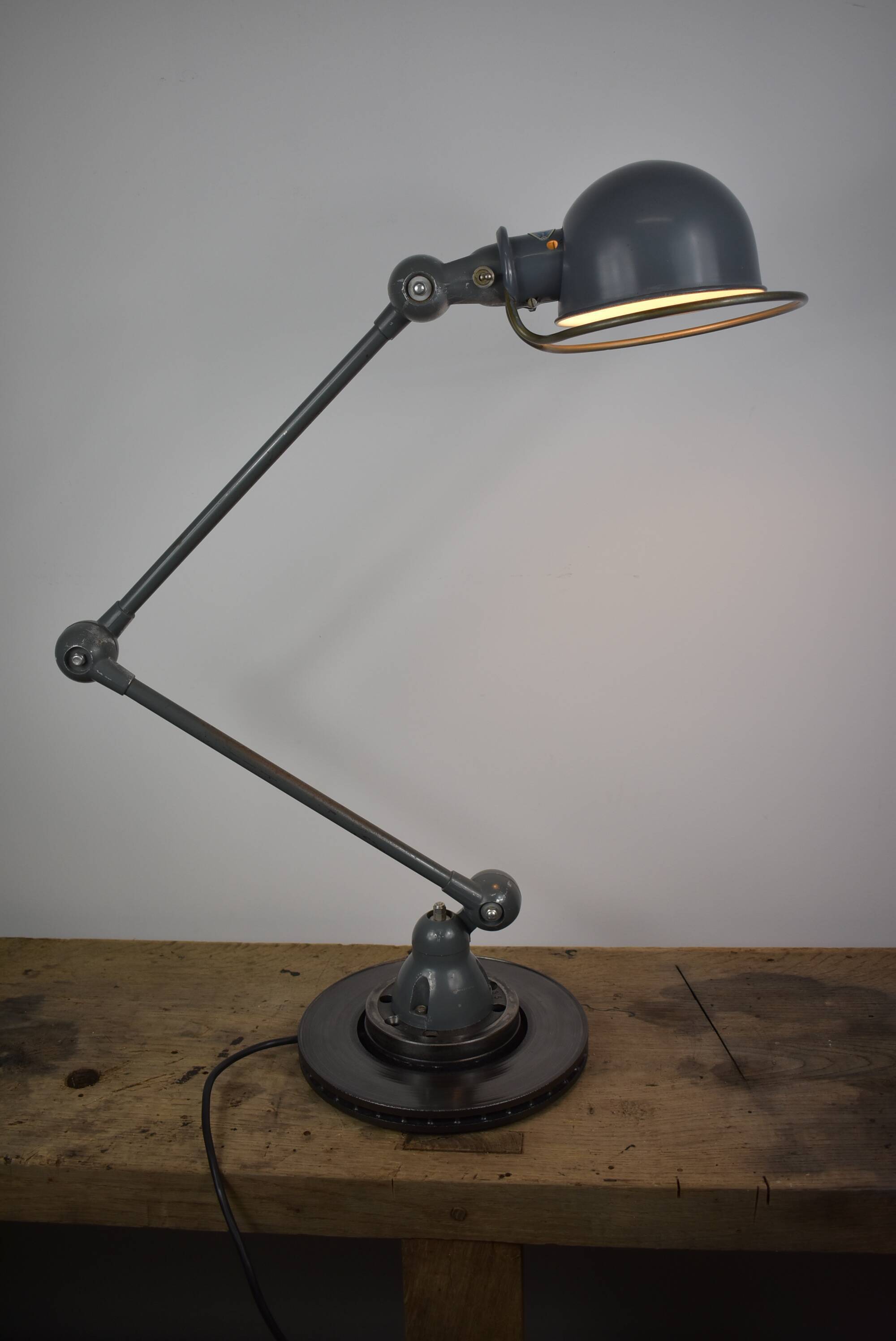 Jielde lamp on industrial metal base