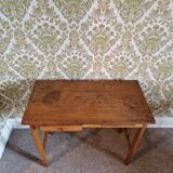 Old wooden desk with bars