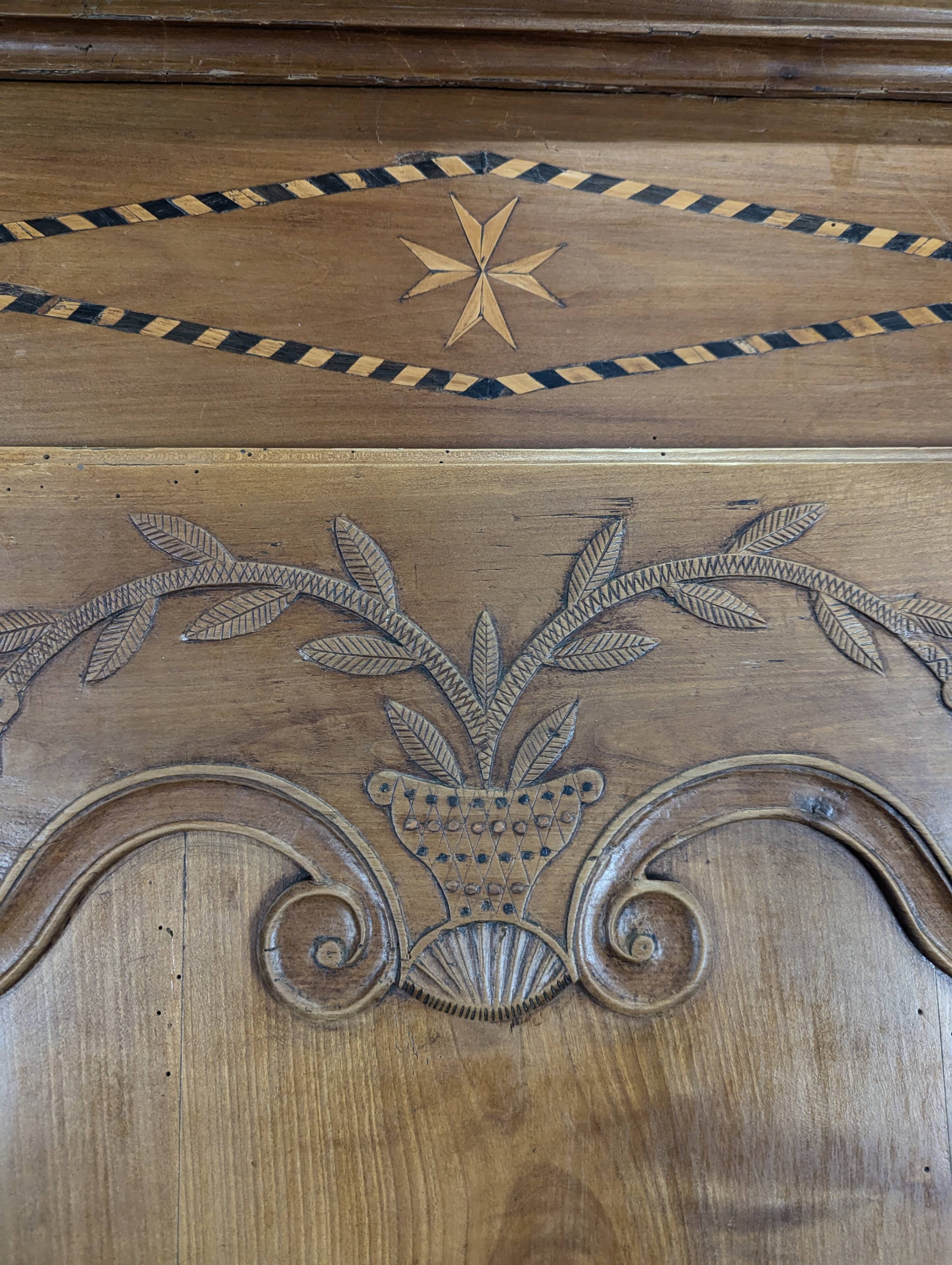Standing man Louis XV in carved and marquetry cherry wood with a star.