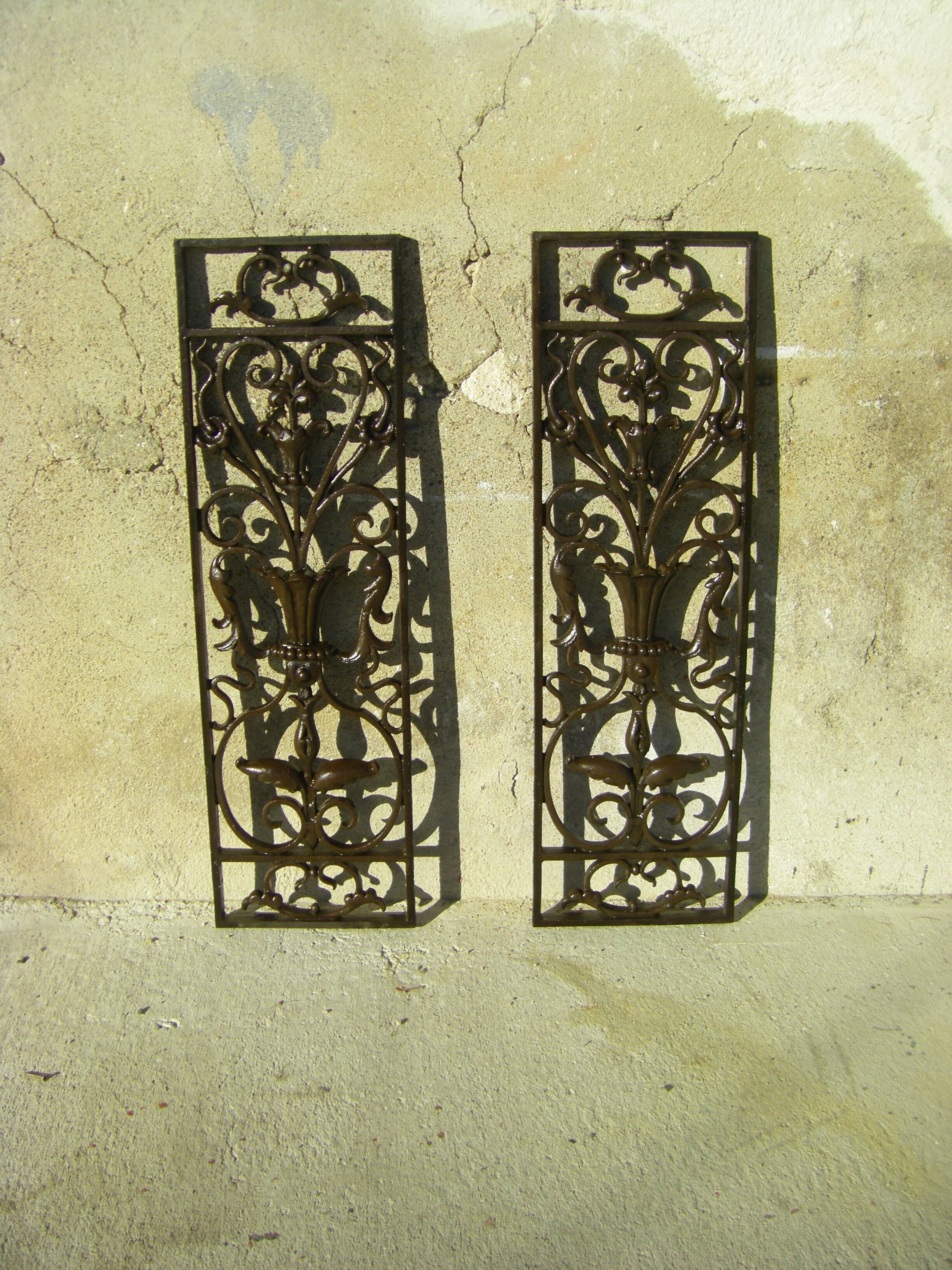 Pair of wrought iron door grilles from Dammarie