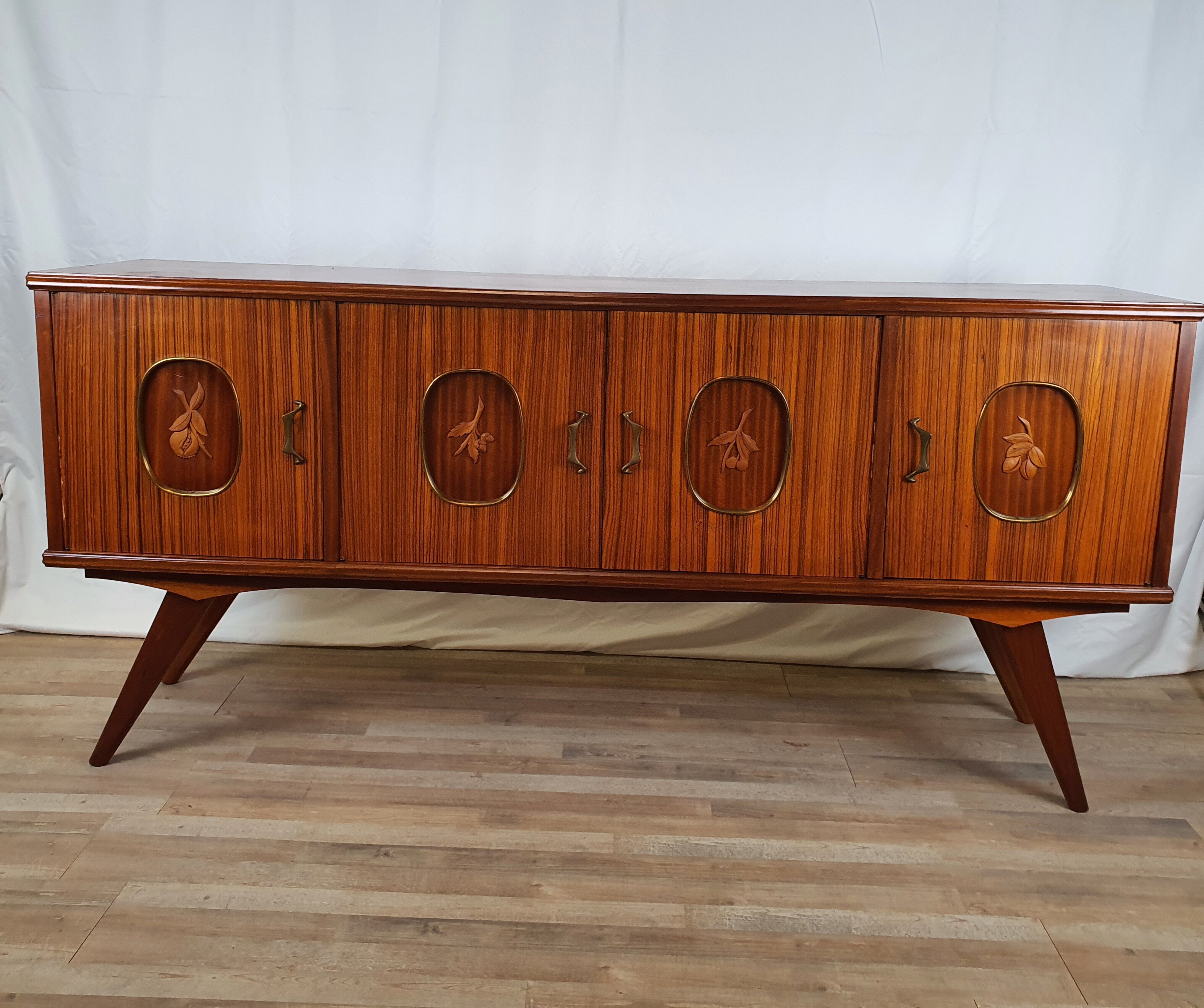 1960s sideboard with decorated doors in wood and brass