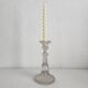 Antique baluster-shaped molded glass candlestick holder