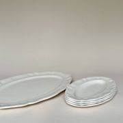 Shaped plates and dishes in Sarreguemines earthenware.