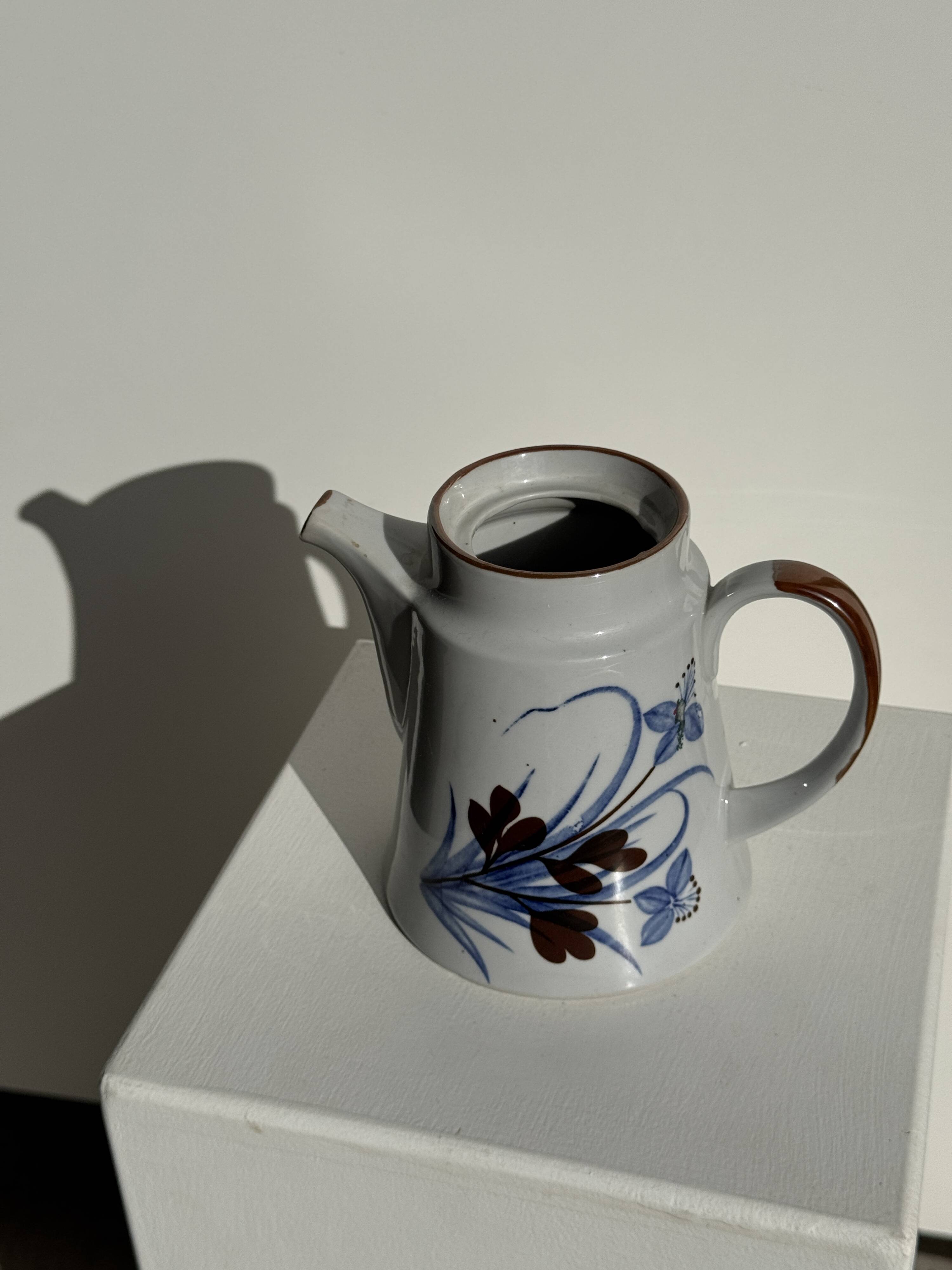 Teapot with stylised blue and brown flowers H18