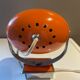 Orange eye ball wall lamp