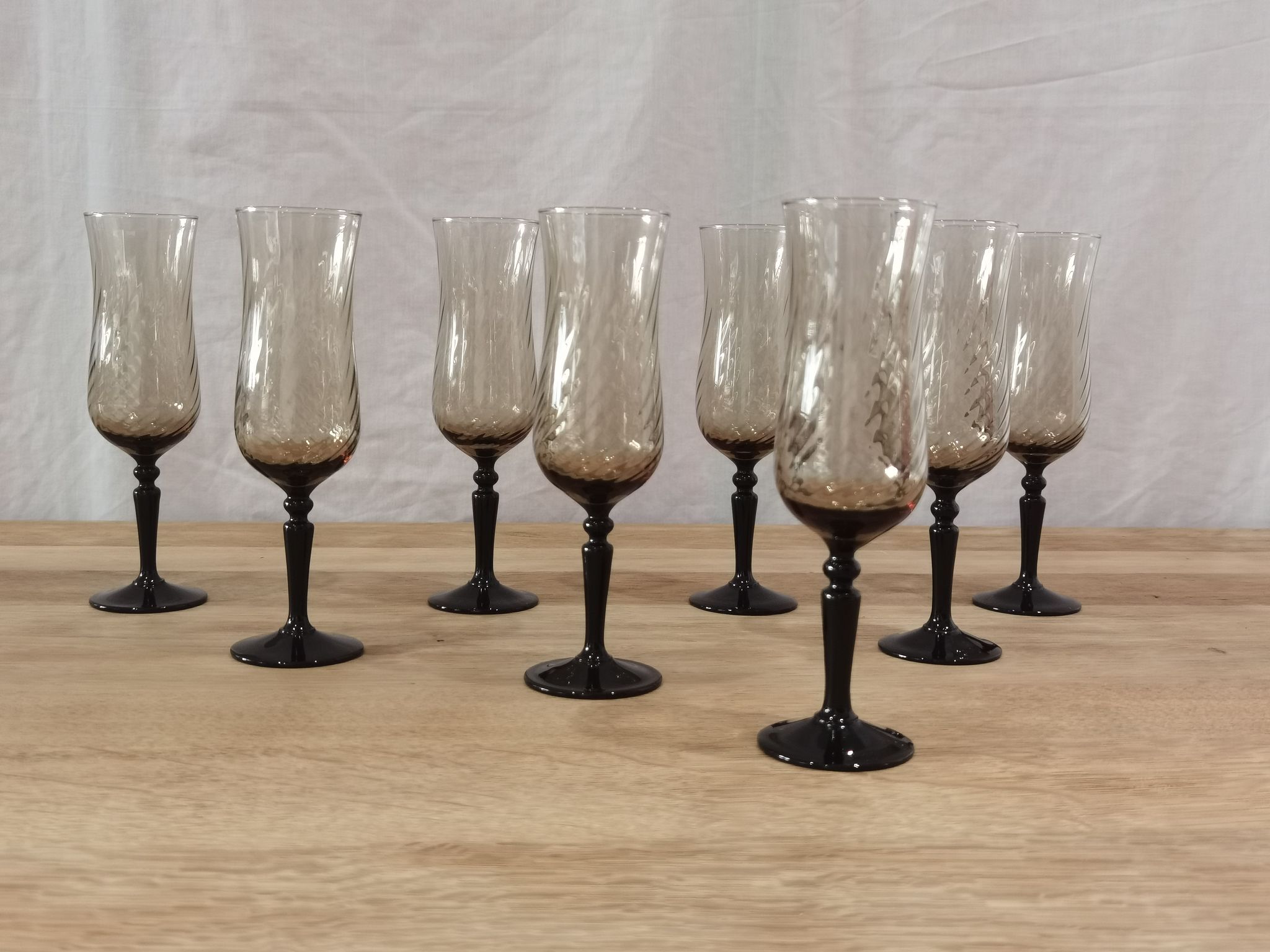 8 vintage smoked champagne flutes with black feet Arcoroc