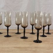 8 vintage smoked champagne flutes with black feet Arcoroc