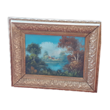 Old oil with golden frame. The lake.
