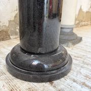 Set of 4 marble columns or pedestals.