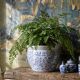Vintage Chinese cache-pot in blue and white porcelain with a floral design.