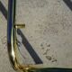 Nested table in gold metal and glass