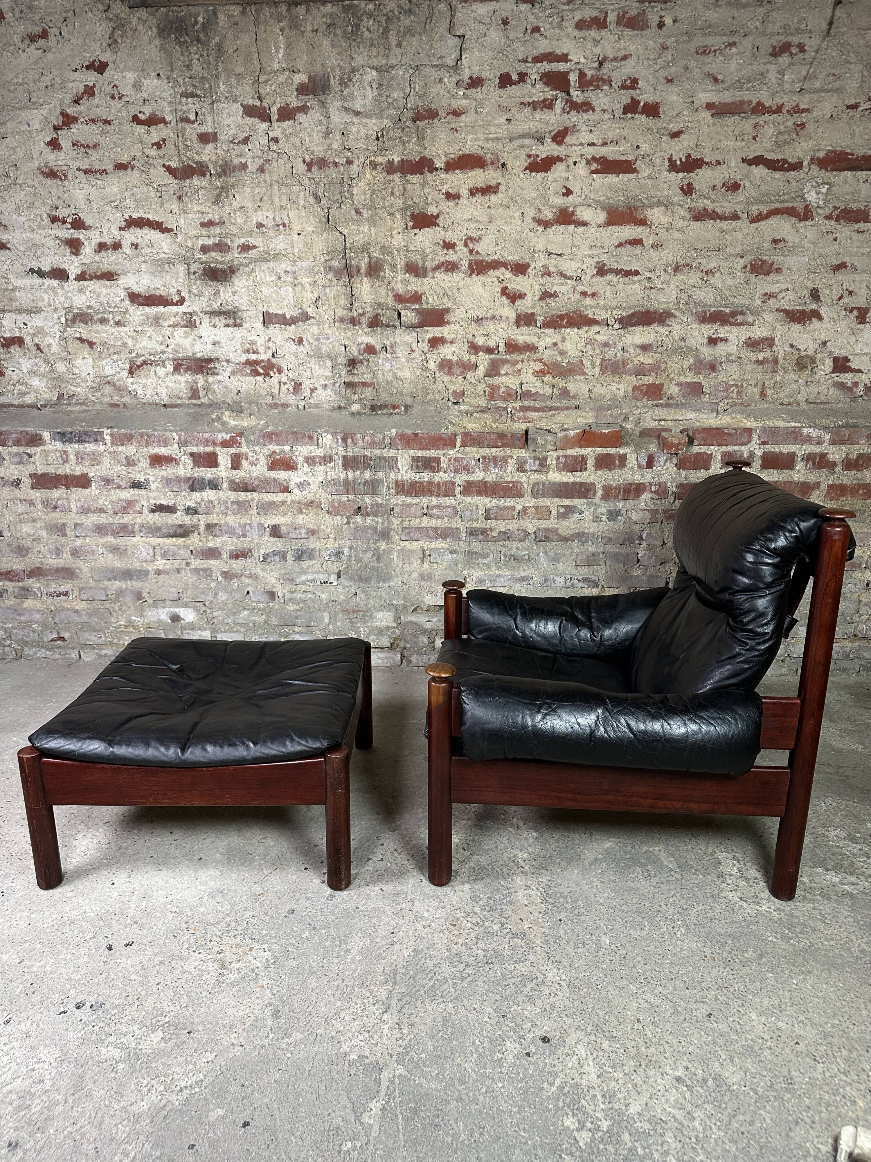 Admiral armchair and its ottoman by Erik Merthen Sweden vintage 1960