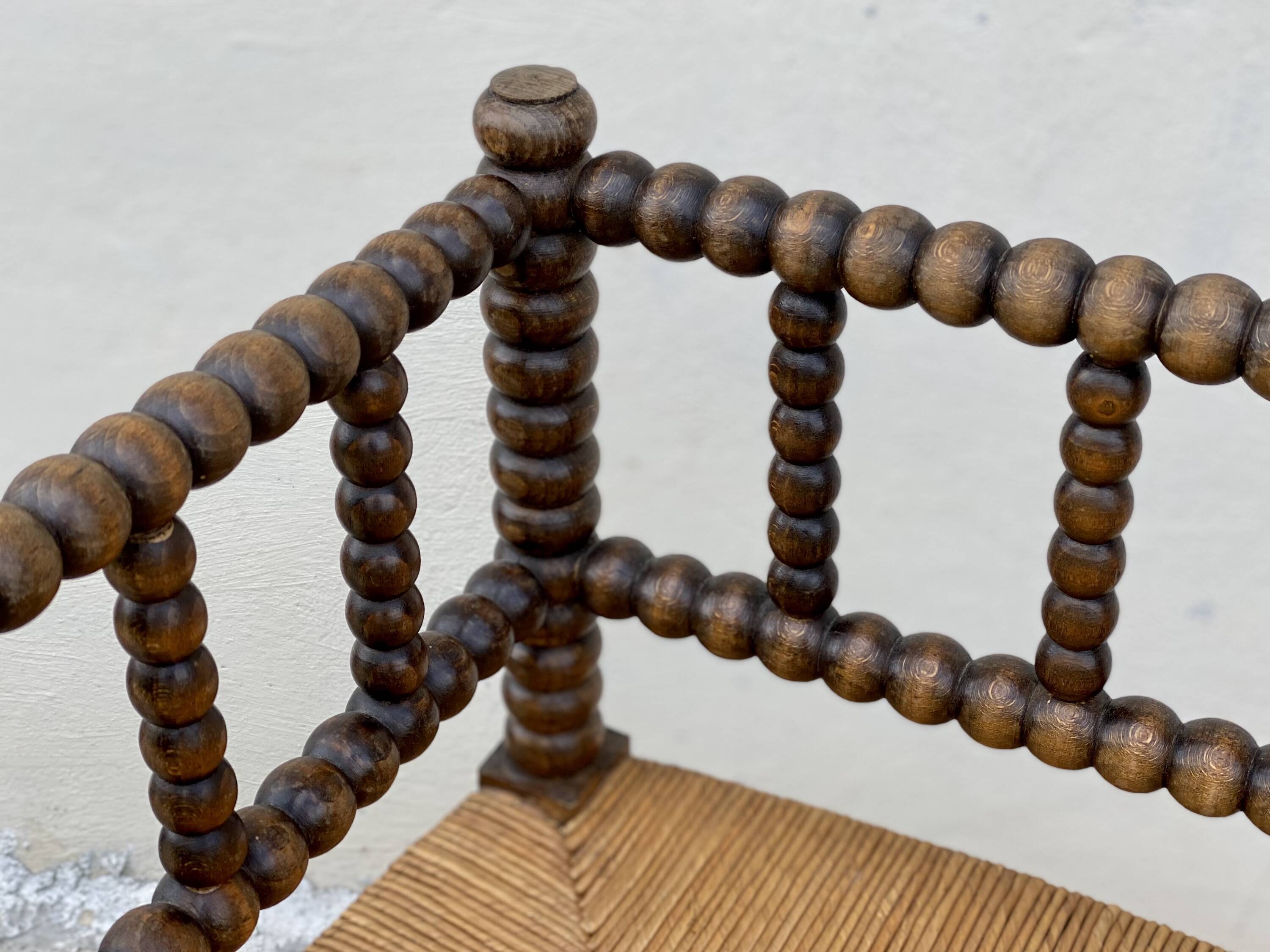 Art Deco turned wood straw corner armchair